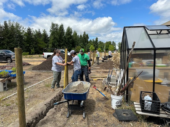 Team Rubicon at Bybee Lakes at Build-a-Fence Day One.