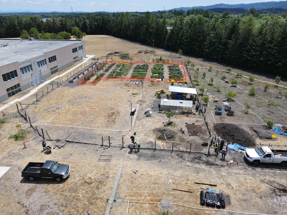 Team Rubicon at Bybee Lakes at Build-a-Fence Day One. - Drone View